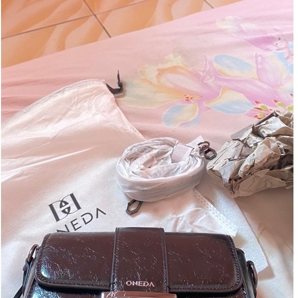 tas oneda