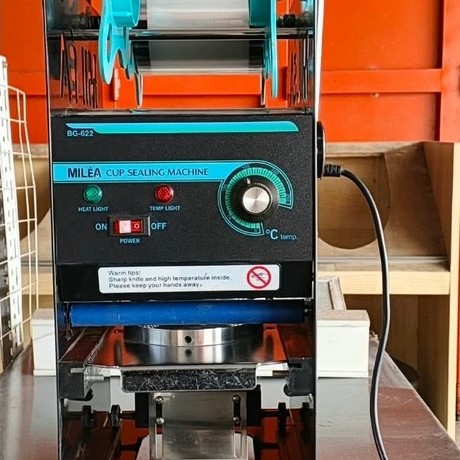 (Bekas) Mesin Cup sealer Milea. cepat dan bagus serta efisien gratis sealer plastik