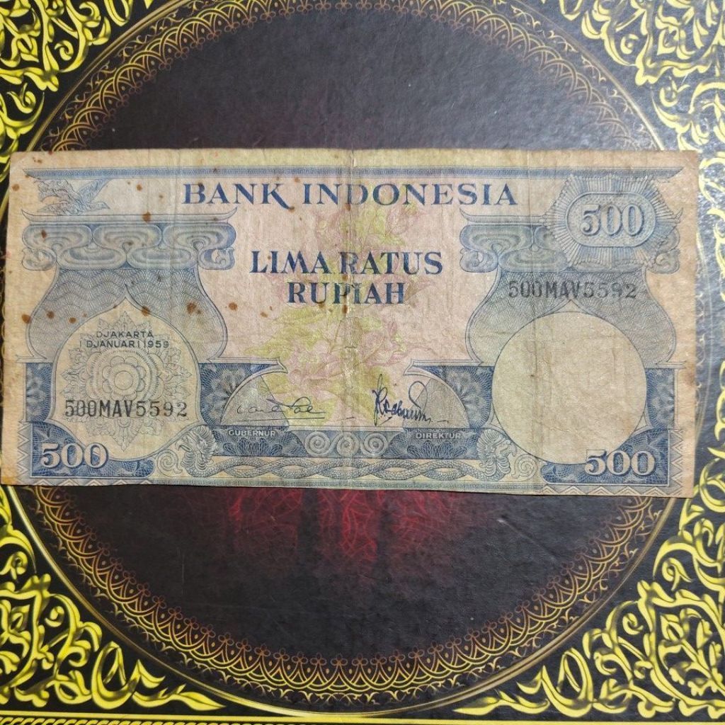 Uang seri bunga 500 rupiah 1959 vf cutting margin bawah