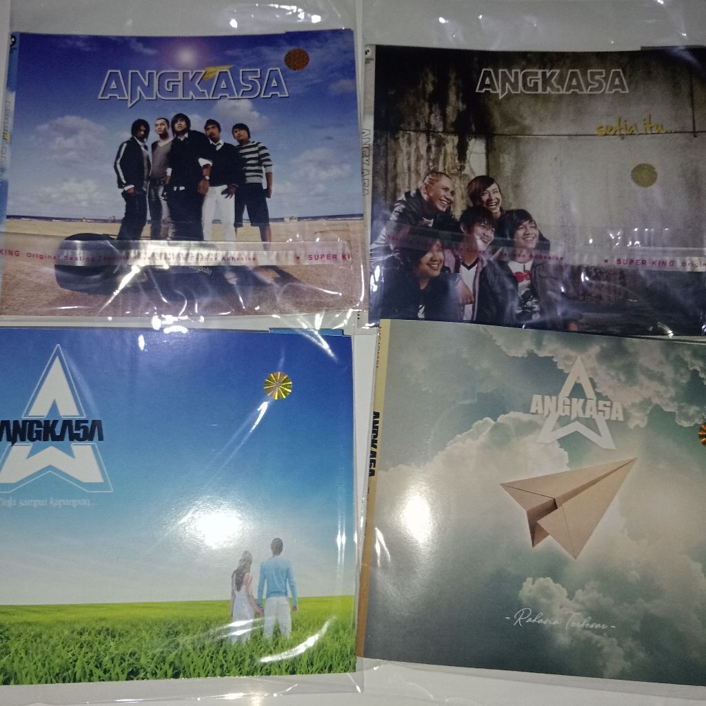[SEPAKET] 4 ALBUM CD ANGKASA BAND - JANGAN PERNAH SELINGKUH, SETIA ITU, CINTA SAMPAI KAPANPUN, RAHAS