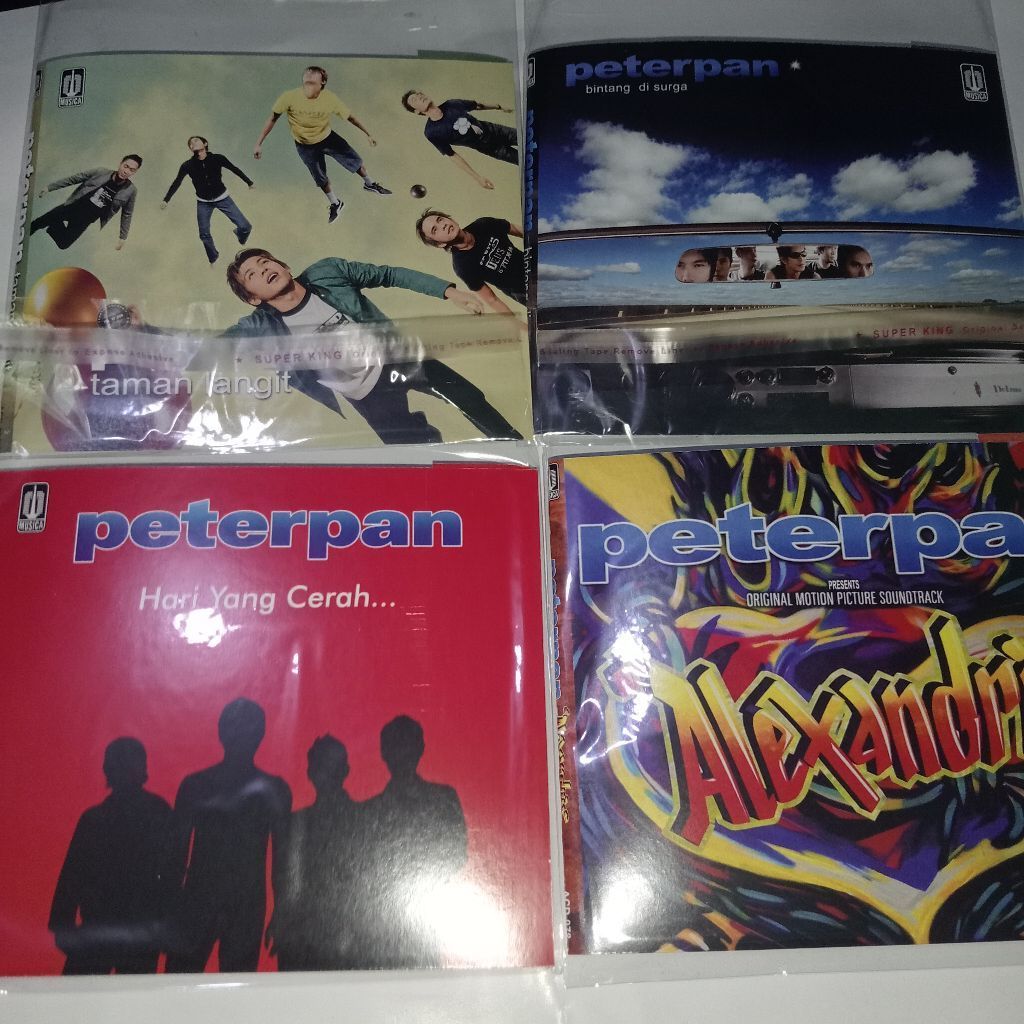 [SEPAKET] 4 ALBUM CD PETERPAN - TAMAN LANGIT, BINTANG DI SURGA, ALEXANDRIA, HARI YANG CERAH
