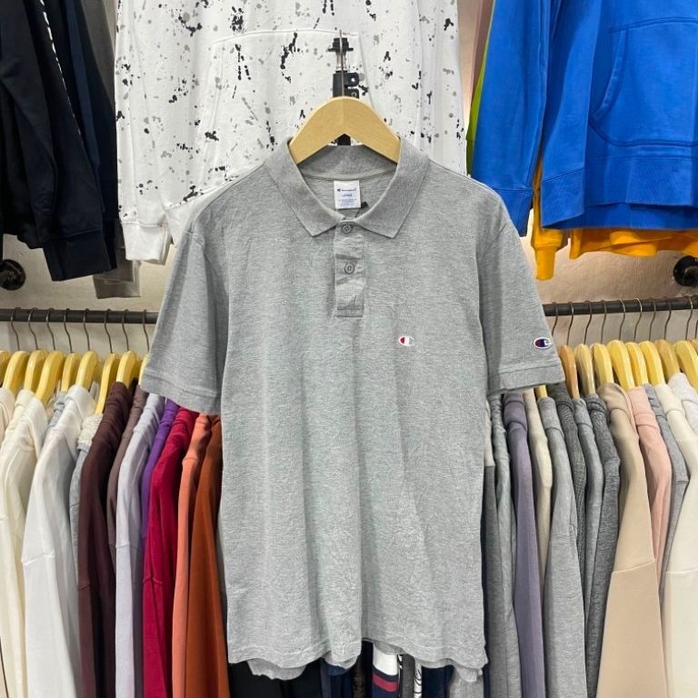 kaos polo / polo shirt champion abu ( L )