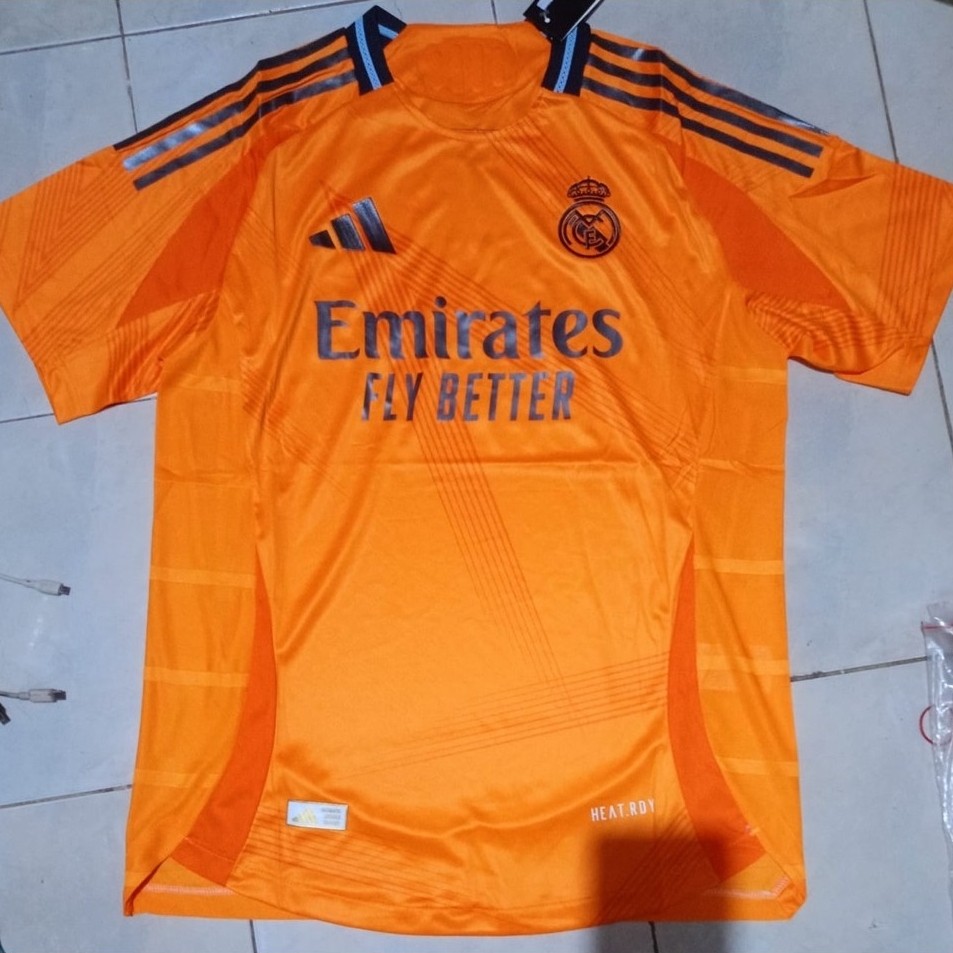 Jersey Bola Sepak Real Madrid Oranye Emirates Fly Better Lengan Pendek