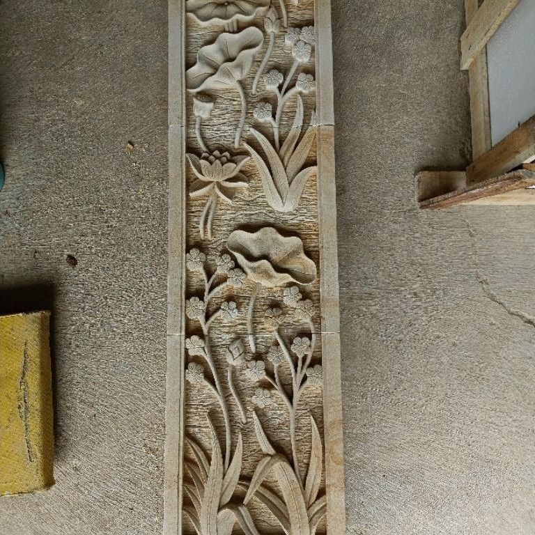 relief bunga bahan batu paras