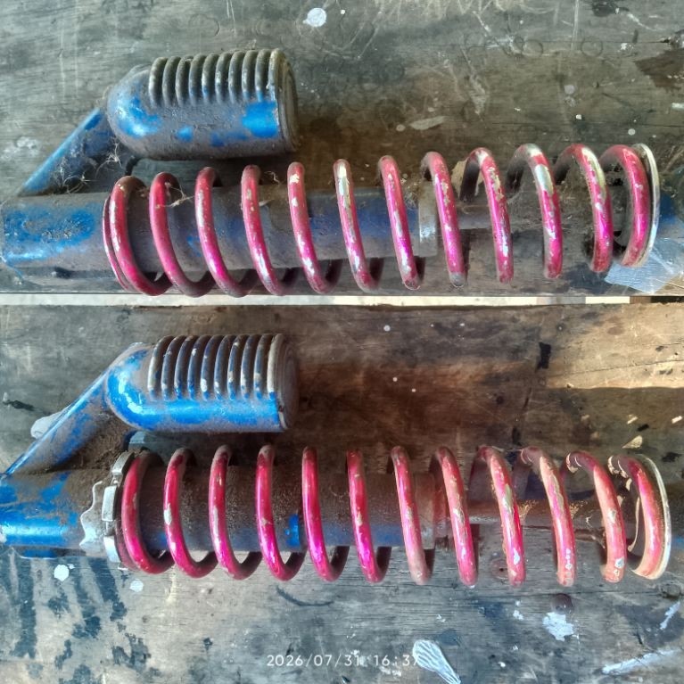 shock belakang tmt bahan