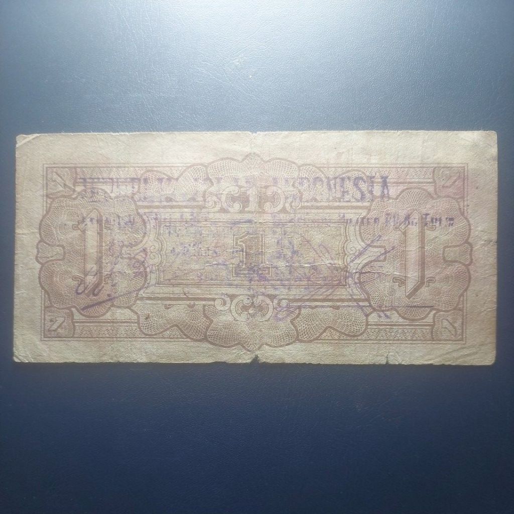 1 gulden cap pemberontak kahar muzakkar stempel depan belakang. rare.