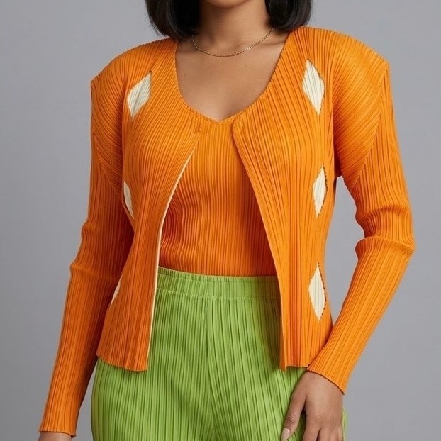 Issey Miyake Pleats Please Cardigan feturing distinctive diamond