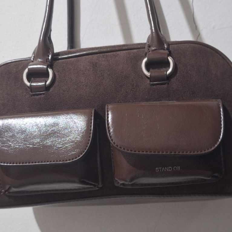 tas stand oil