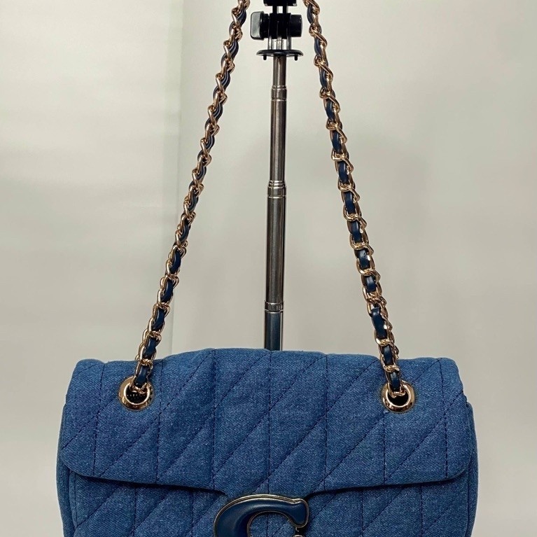 the Coach Quilted Denim Tabby Shoulder Bag in Indigo Blue