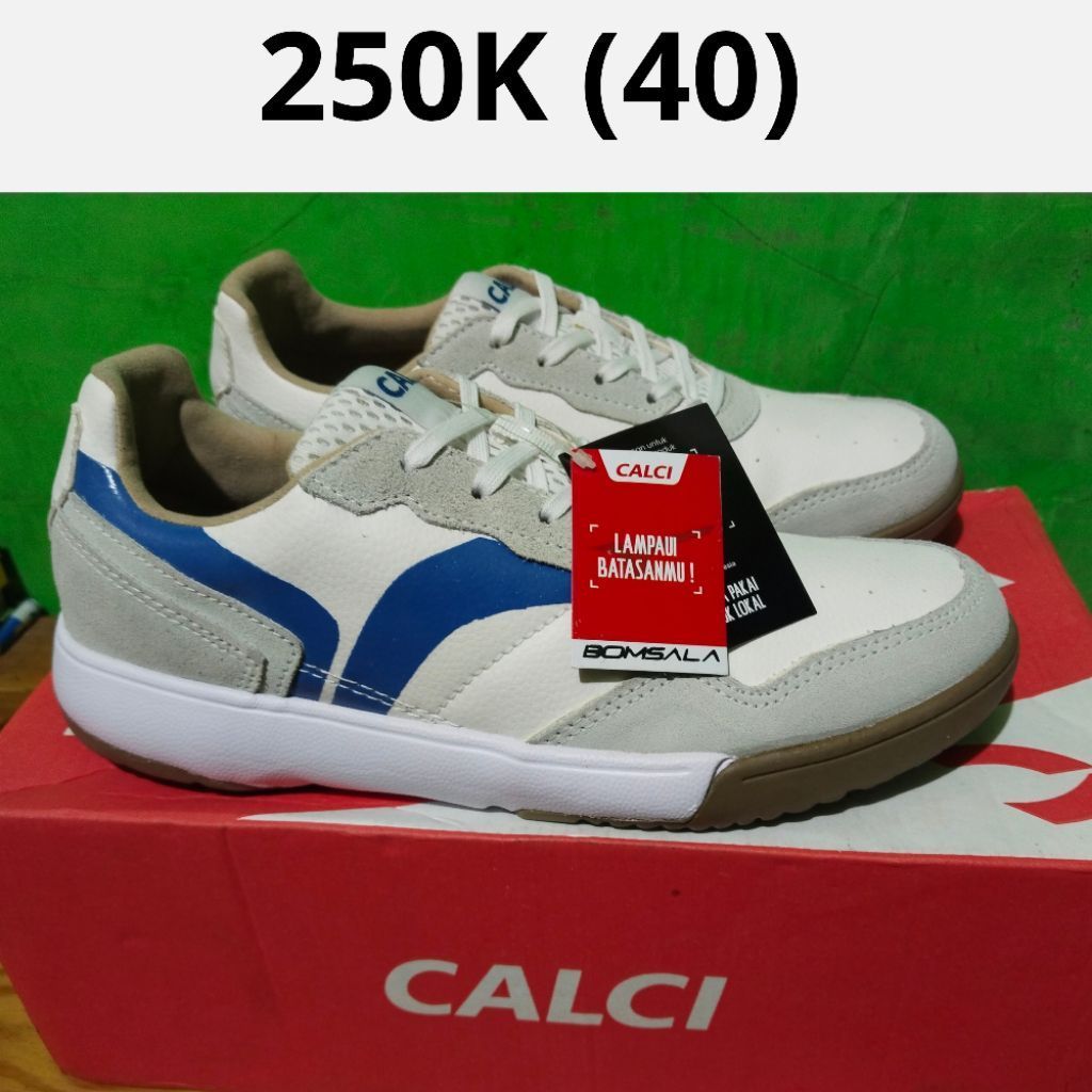 Sepatu futsal Calci ori