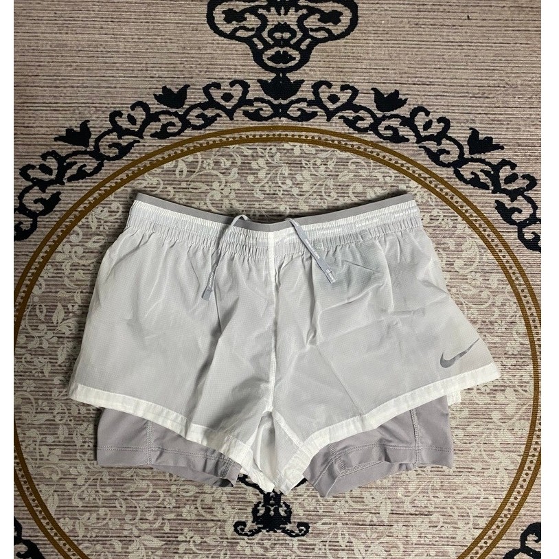 celana nike running division