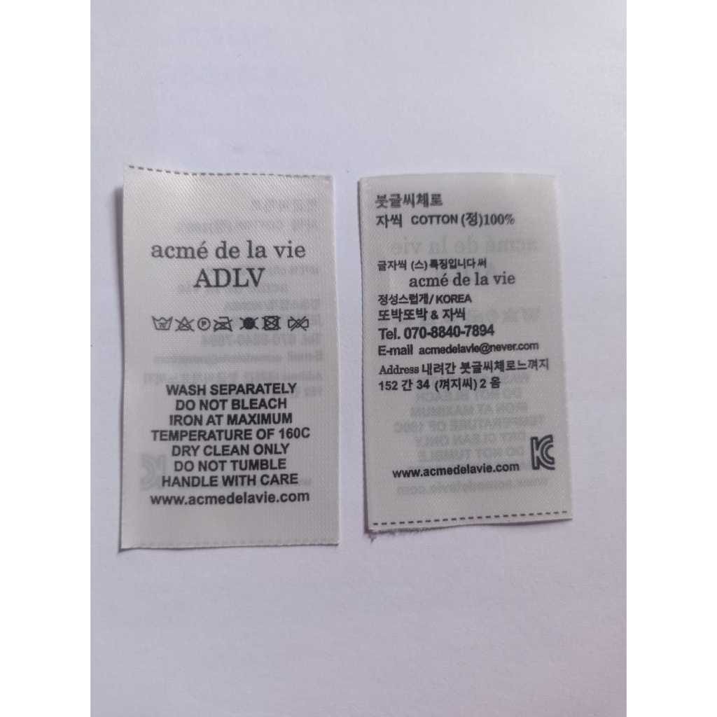 TAG LABEL ADEL WOVEN & WOSSHING