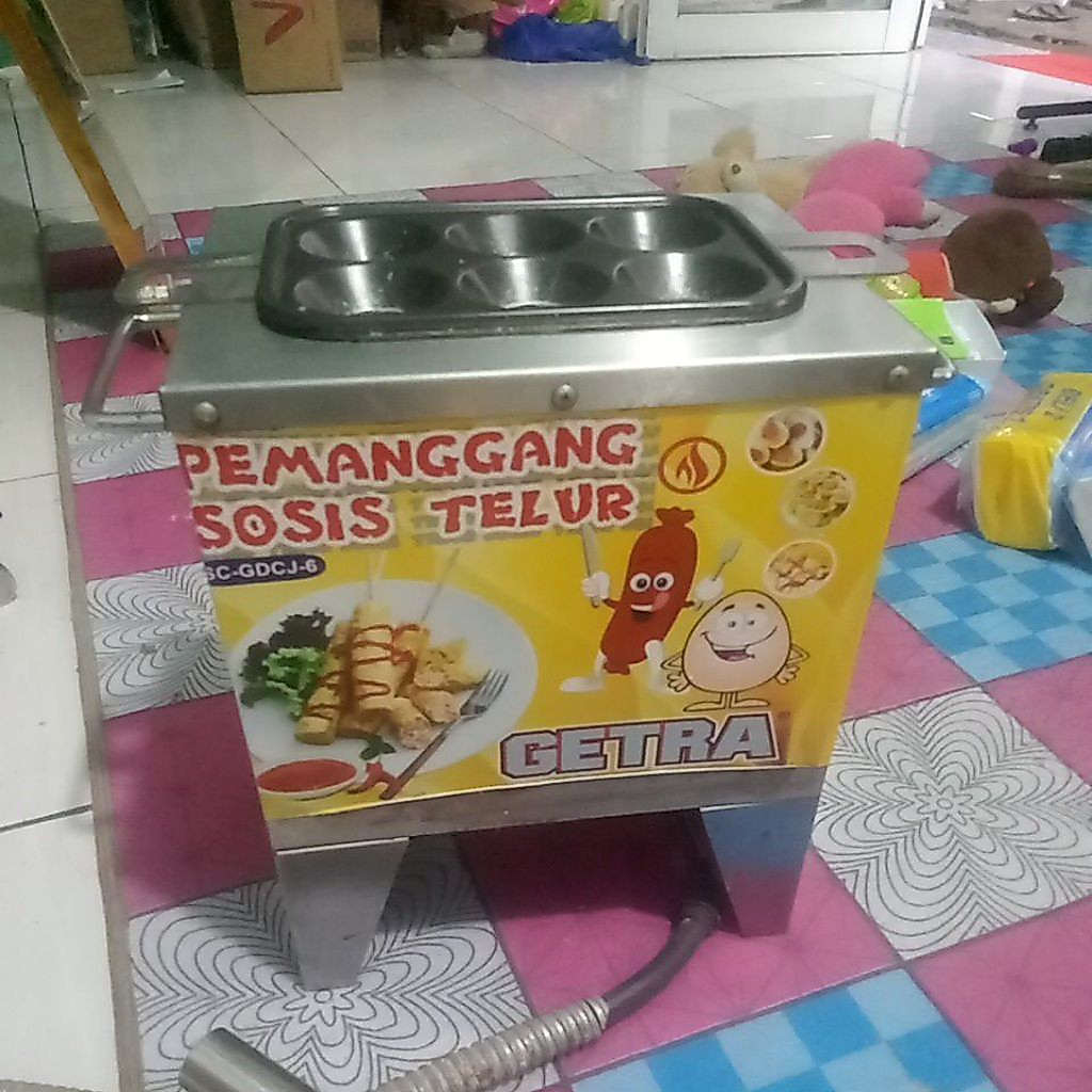 pemanggang sosis telur