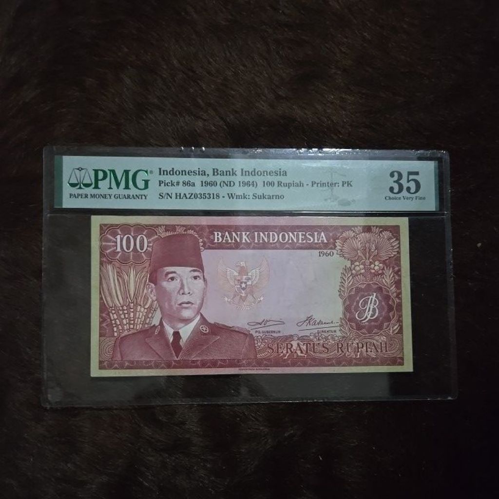 Oeang Koe Now PMG 100 Rupiah Soekarno Tahun 1960 (2)