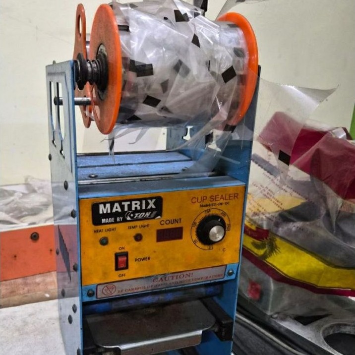 Matrix_Mesin Cup Sealer Press Gelas Plastik Bekas Berfungsi Baik