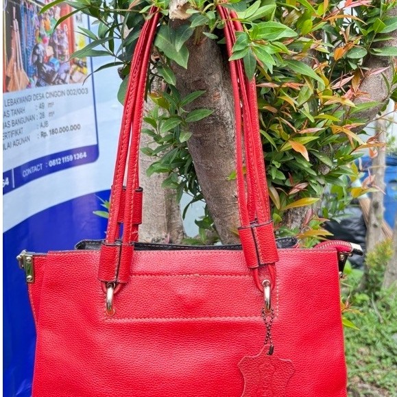 tas merah kulit