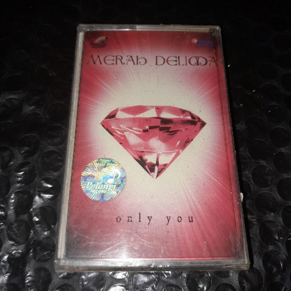 kaset segel merah delima band only you