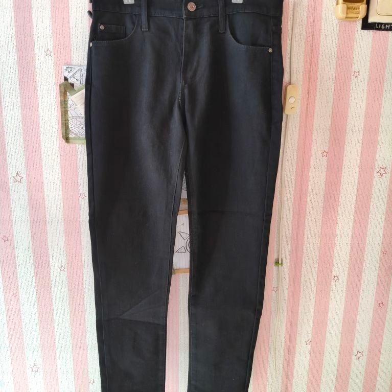 celana panjang hitam Saint Laurent