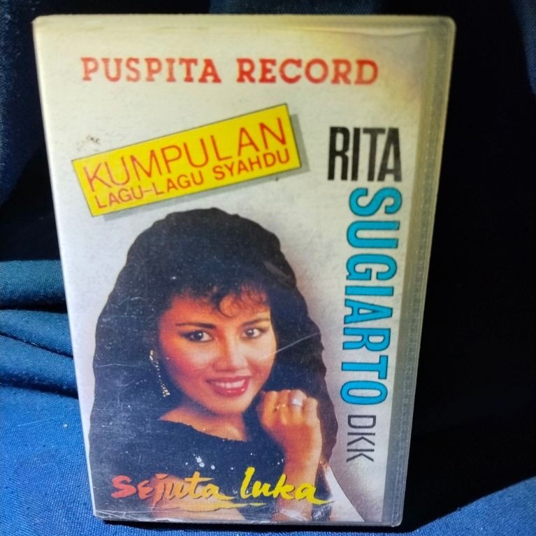 kaset pita dangdut original Kumpulan Lagu-lagu Syahdu Rita Sugiarto. Sejuta Luka. MULUS SPT BARU.