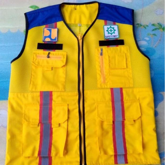 Rompi PU Safety Lapangan Dinas Kementerian PUPR dengan Desain Kuning dan Biru
