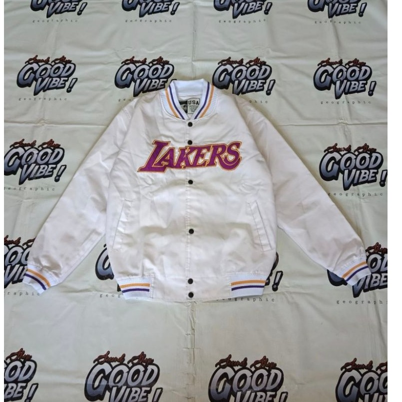 varsity starter lakers los angeles white good condition