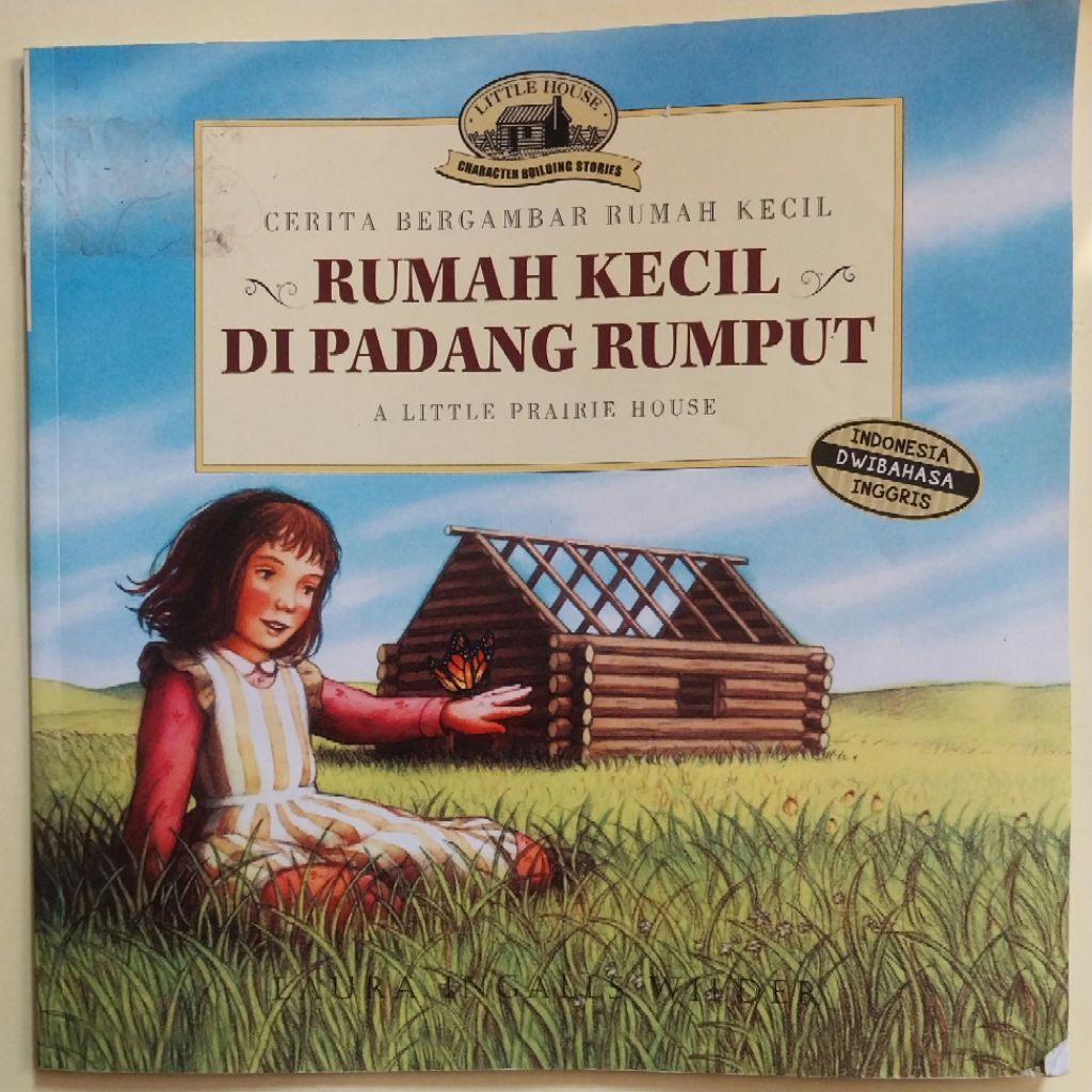 cerita bergambar dwibahasa (Indonesia-Inggris) dari seri Rumah Kecil karya Laura Ingalls Wilder yang