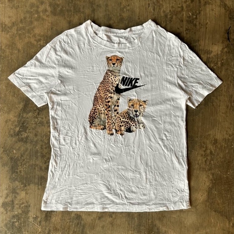 Kaos Nike Woman Leopard Logo