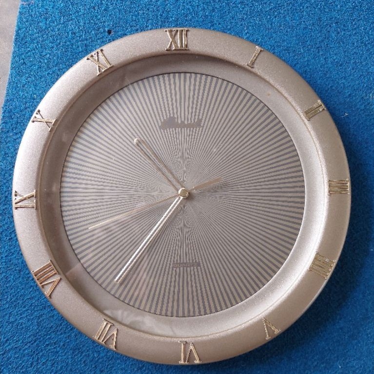 jam dinding orient