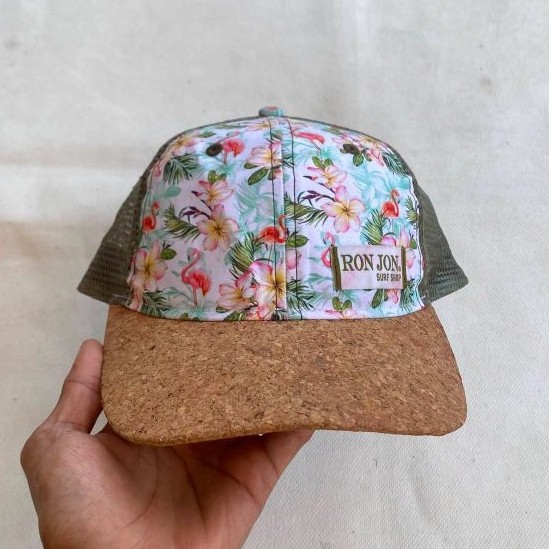 Topi Trucker RON JON Surf Shop motif bunga warna pastel dengan visor cork