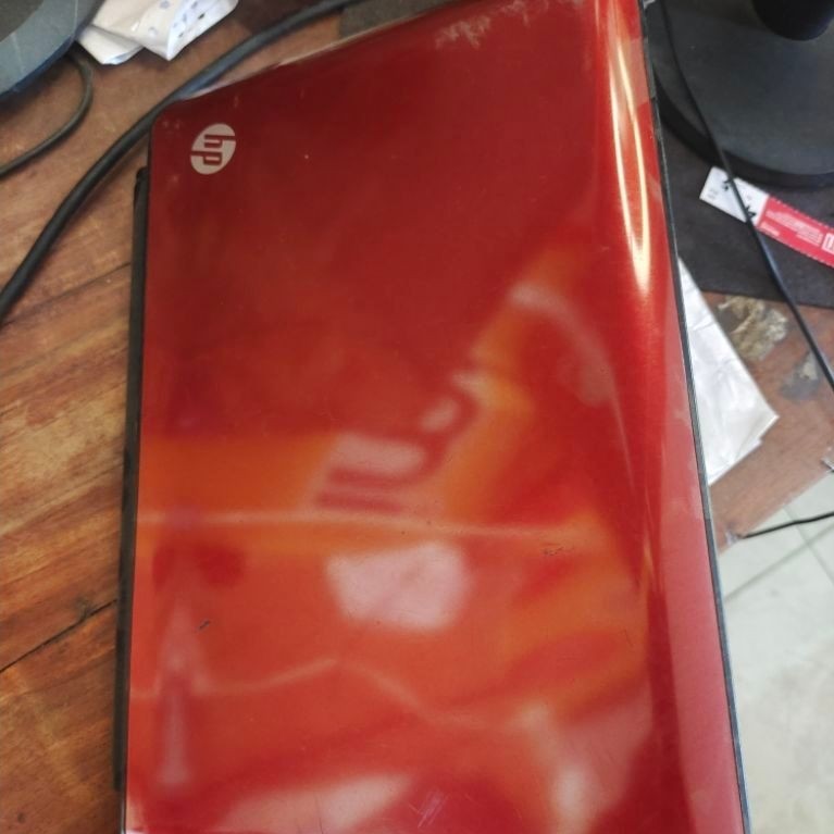 Notebook HP warna merah bekas