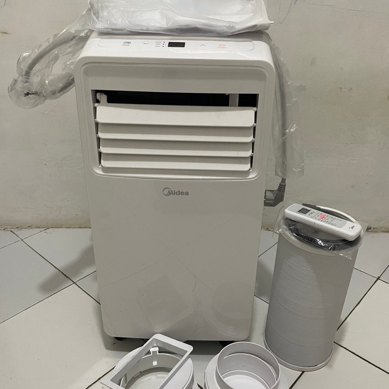 ac portable midea 1/2 PK