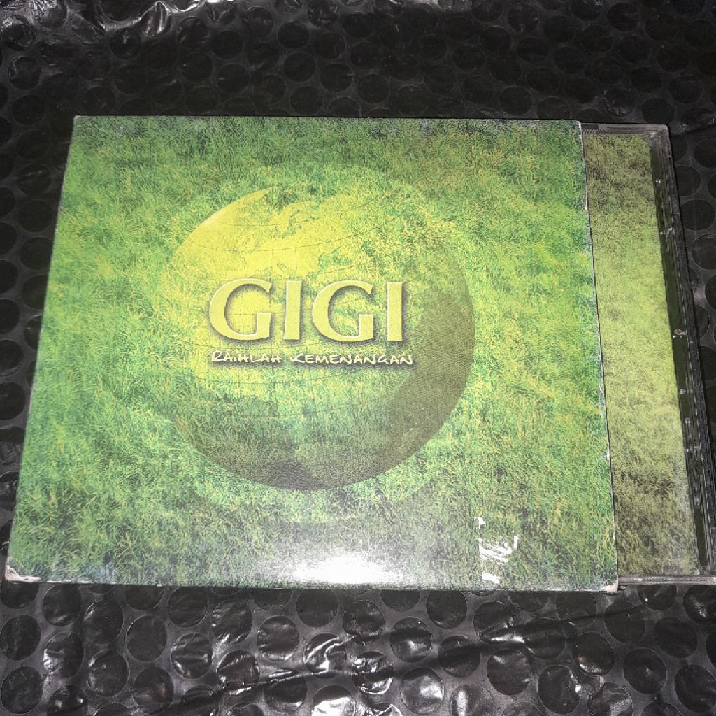 cd gigi band raihlah kemenangan