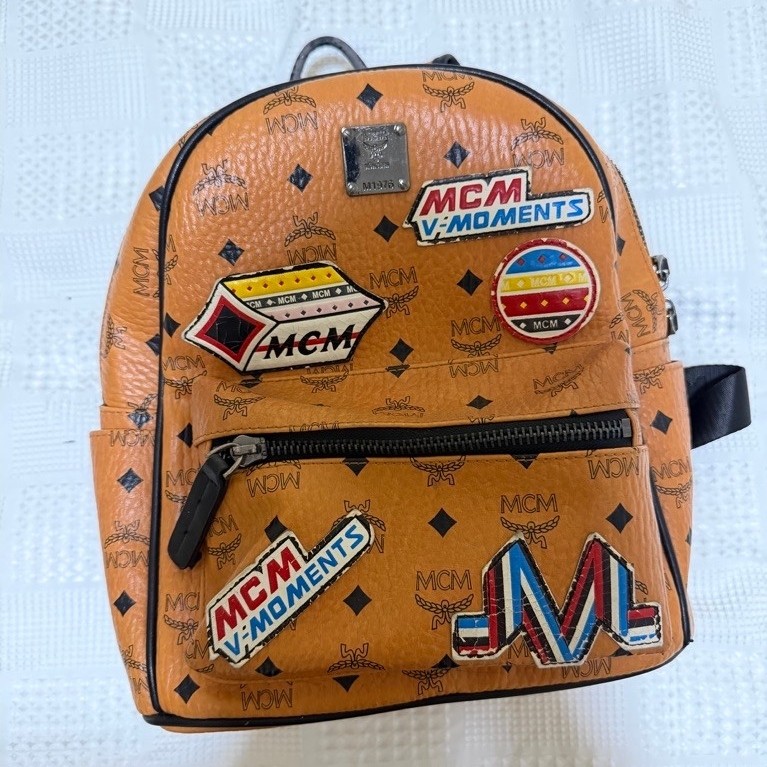 MCM Stark Backpack Visetos Victory Patches Medium Cognac