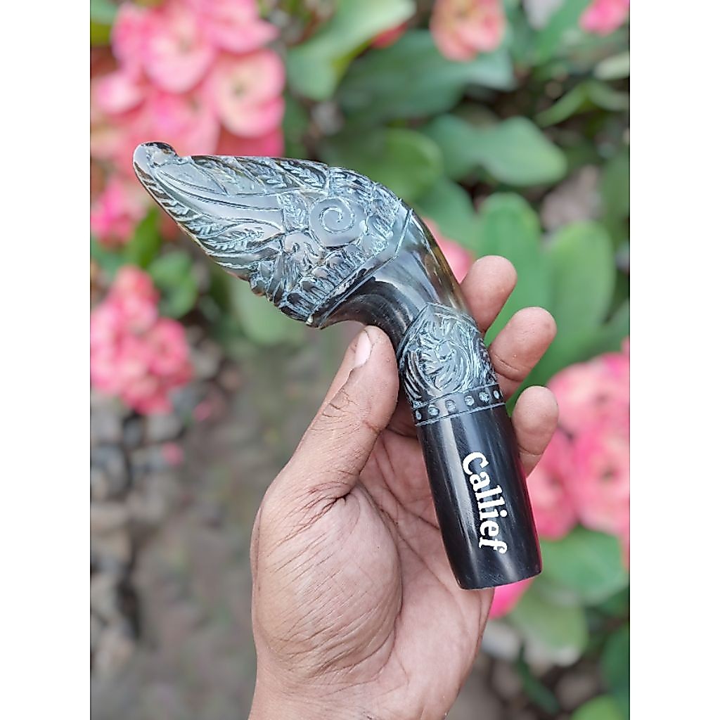 Gagang bahan tanduk ukir Makara