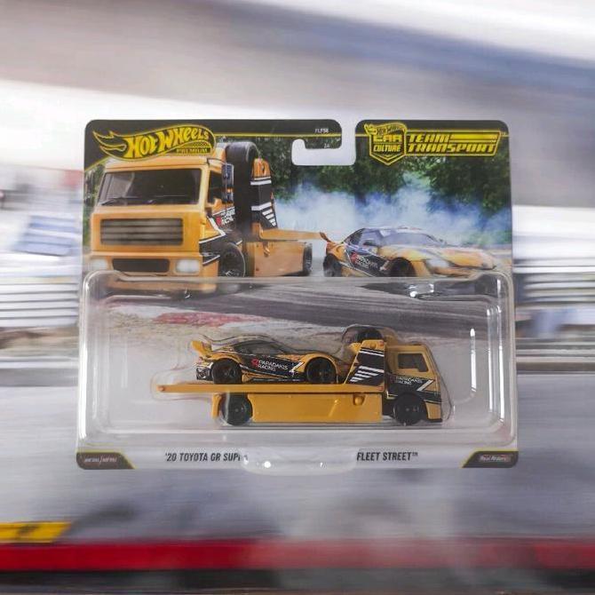 Hot Wheels Premium Team Transport 20 Toyota GR Supra & Fleet Street - Diecast Mobil