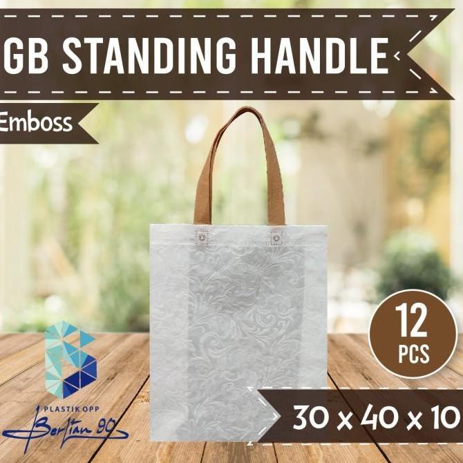 Goodie Bag standing handle emboss 30 x 40 Tas Spunbond Tali emboss