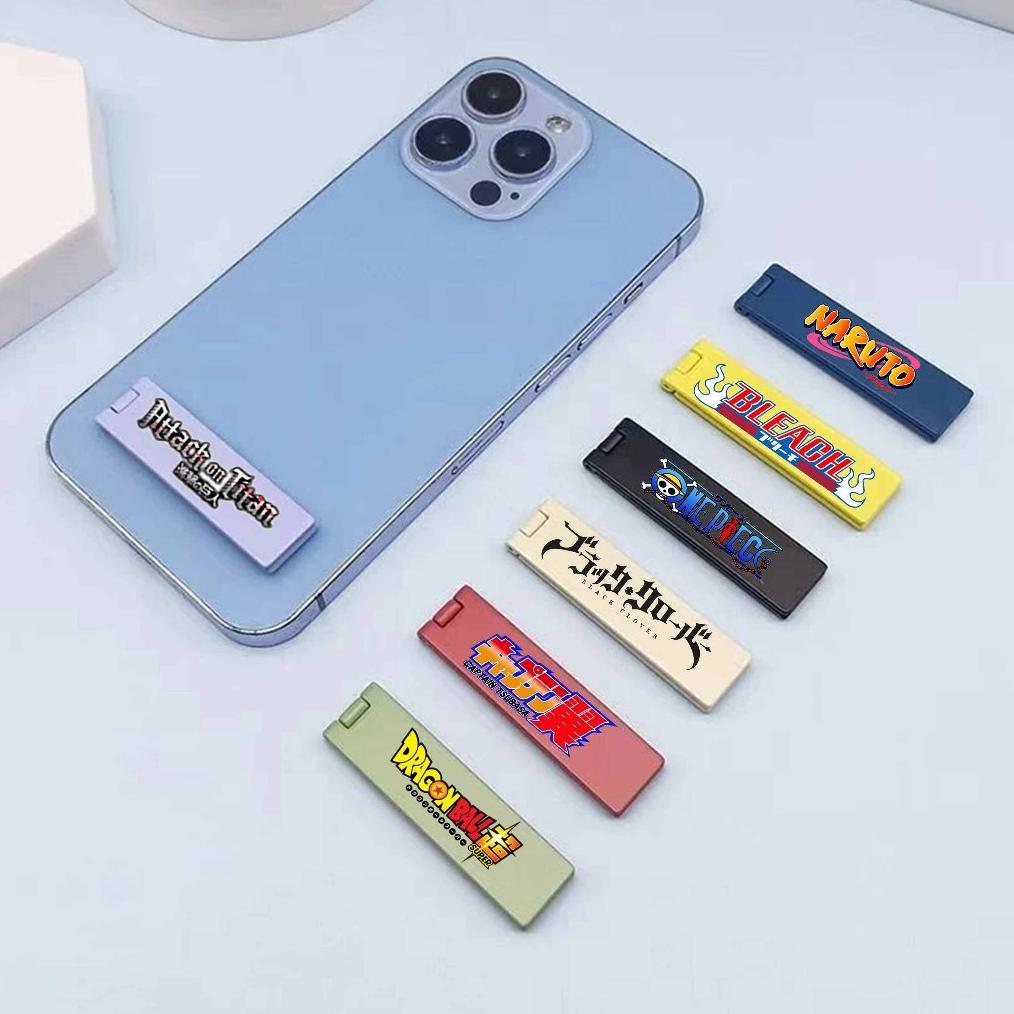 DY Dudukan Ponsel Braket Logam Motif Logo Anime Ultra Tipis Stand Handphone Meja Atau Dudukan Hp Lip