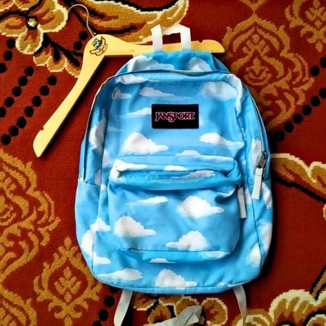DB170 - Jansport Tas Ransel Sekolah Motif Awan Biru Cocok Untuk Pria & Wanita Bahan Kanvas dengan De