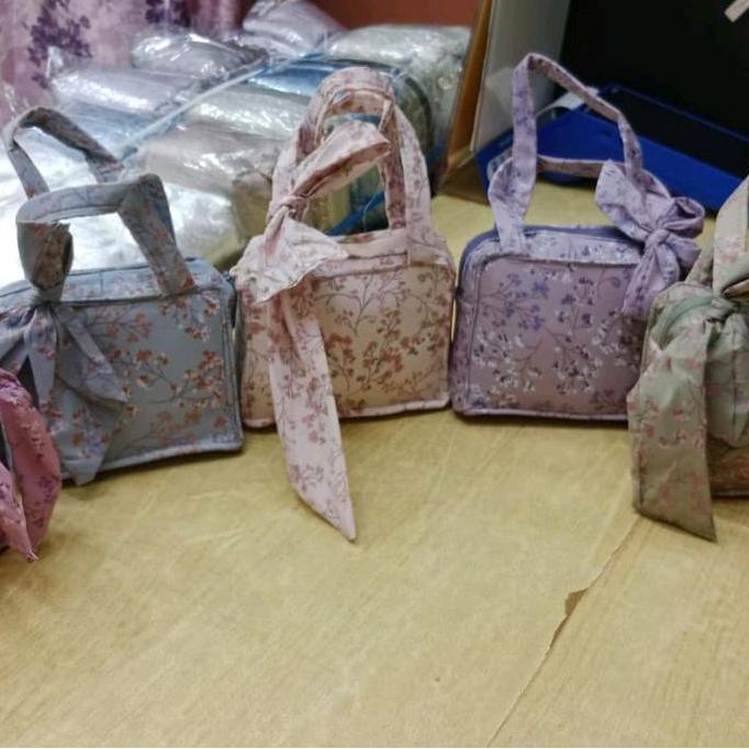 travelling premium, Mukena