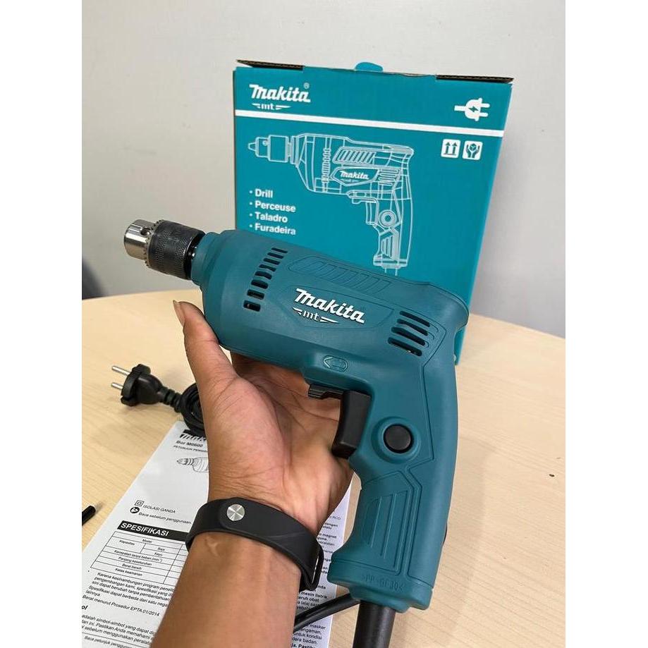 Makita Mesin Bor Listrik M0600B Kecepatan Variabel & Fungsi Bolak-Balik Bahan Tahan untuk Kebutuhan 