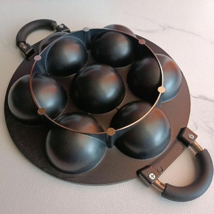 Cetakan kue bikang 7 lubang cekung anti lengket