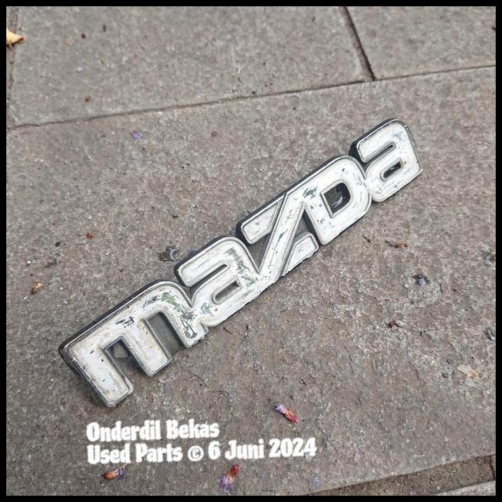 DISKON EMBLEM GRILL MAZDA 323 ELITE TRENDY