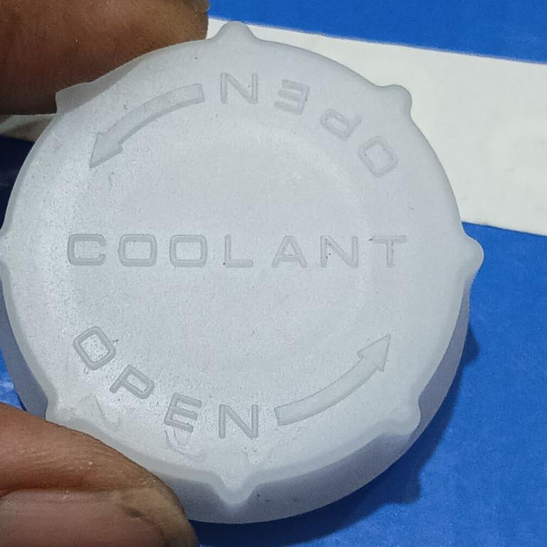 tutup tabung cadangan air radiator xpander