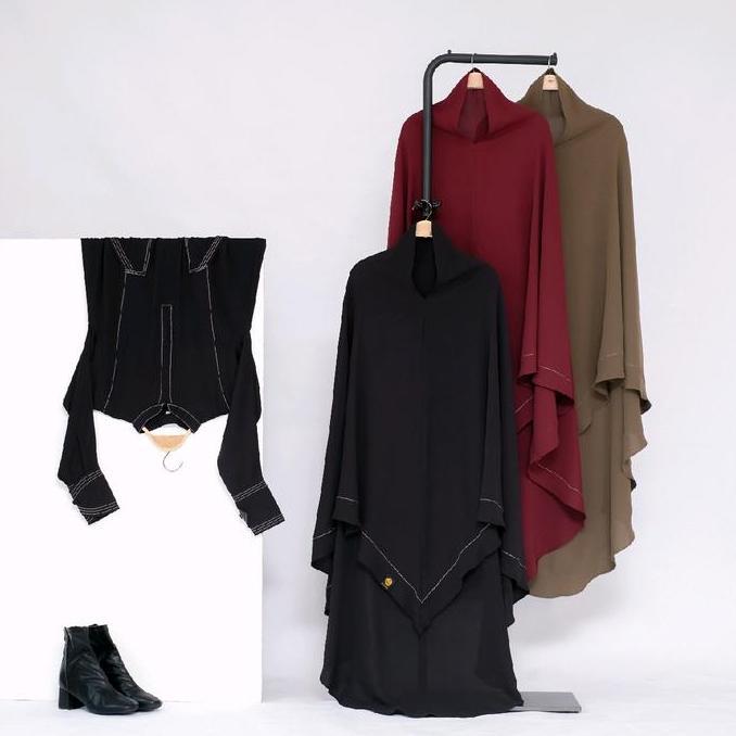 jalinan reborn dengan aksen benang timbul di gamis dan jilbab Cantik Muslim