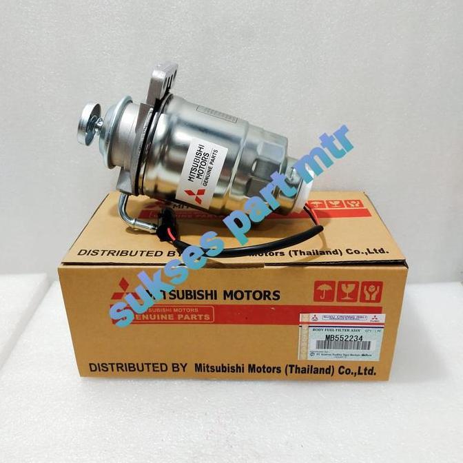 BODY FUEL FILTER ATAU POMPA SOLAR KOMPLIT L300 DIESEL/L200 MB552234 ORIGINAL DAN TERPERCAYA