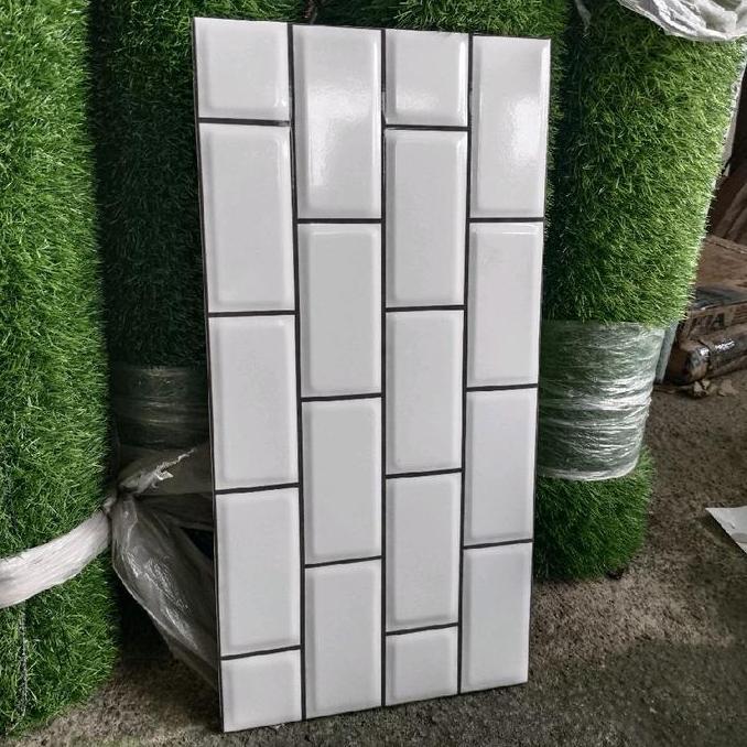 KERAMIK 25X50 GLOSSY BATA PUTIH MOTIF /  KERAMIK 25X50 BATA BEVEL