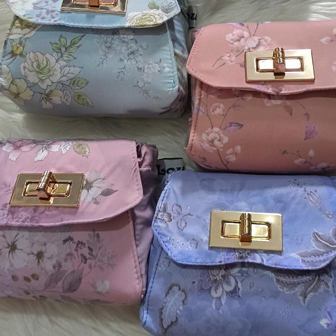 Loufie mukena travel motif parasut Lembut