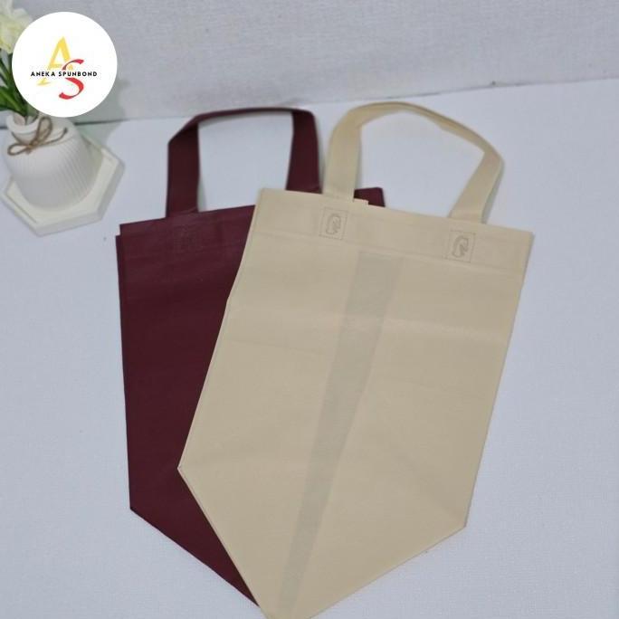 Goodie bag Box bag uk 18 Tas spunbond model mcd ( isi 12 pcs)