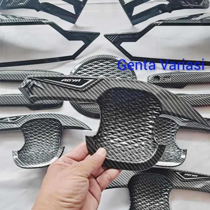 Set Aksesoris Toyota Agya 2023 Carbon - Garnish Lampu Depan & Belakang, Cover Handle, Outer Pintu, d