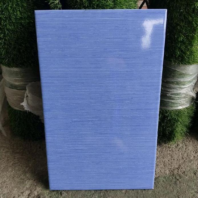 KERAMIK 25X40 BIRU GLOSSY
